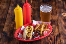 Hot Dog In Basket With Draft Beer