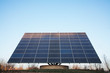 © Mint Images - Solar panels against blue sky