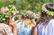 Midsummer with women wearing wraths during a clear and sunny day in Sweden