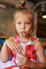 Wall Mural - girl drinking milkshake