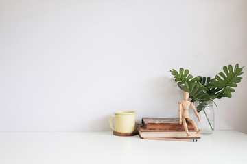 Fototapete - Mockup workspace desk and copy space books,plant and coffee on white desk.