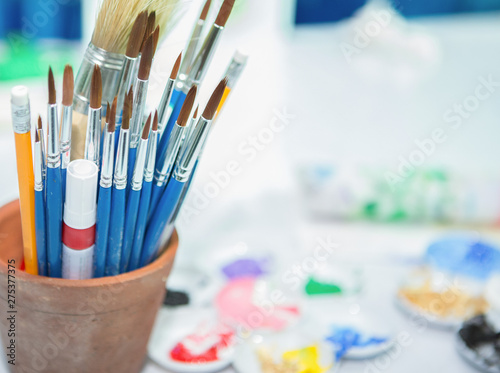 Many brushes and art supplies Slika na platnu