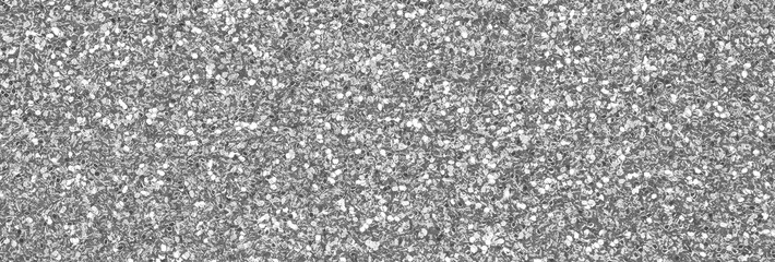 Silver decorative sequins. Background image with shiny bokeh lights from small elements