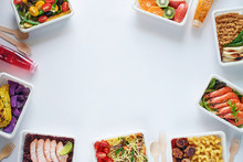 Prepared Meal Delivery Concept With Copy Space. Top View Of Assorted Ready-to-eat Dishes Over White Background: Seafood, Meat, Pasta, Noodles, Quinoa, Veggies And Fruits.