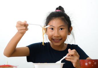 Asian girl eating spaghetti food box from convenient store, modern lifestyle concept.