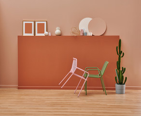 Decorative brown wall in the room with metal chair green and pink style, frame and accessory design.