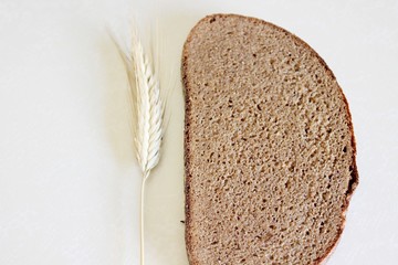 Bread and ear on a white background