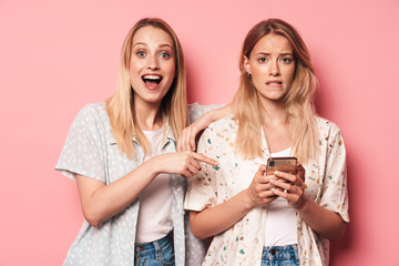 Poster - Two attractive blonde girls wearing summer outfit