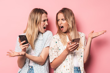 Poster - Two attractive blonde girls wearing summer outfit