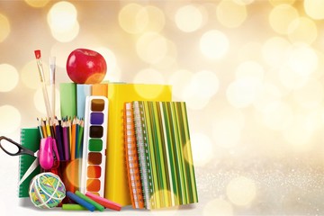 Poster - Colorful school supplies on wooden table background