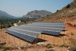 A bank of solar energy panels on the Greek island of Tilos on June 19, 2019. The island aims to become self sufficient in power through solar energy and a wind turbine.