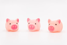 Three Little Pig Fairy Tales, Three Pink Cute Toy Piglets Neatly Arranged On A White Background