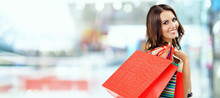 Picture Of Happy Beautiful Girl With Color Shopping Bags, At Mall