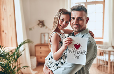 Wall Mural - Father and daughter at home