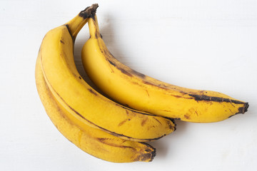 Ripe banana bunch on white background