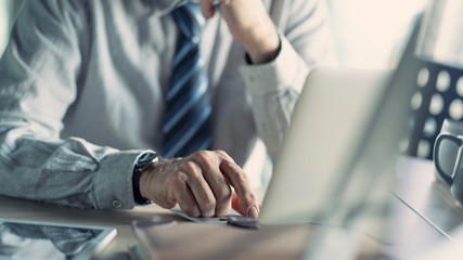 Businessman using computer in the office