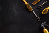 Set of professional hairdresser tools with combs and styling on black background top view mock up