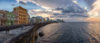 Panoramic view of the Old Havana City, Capital of Cuba, by the ocean coast during a dramatic cloudy sunset.