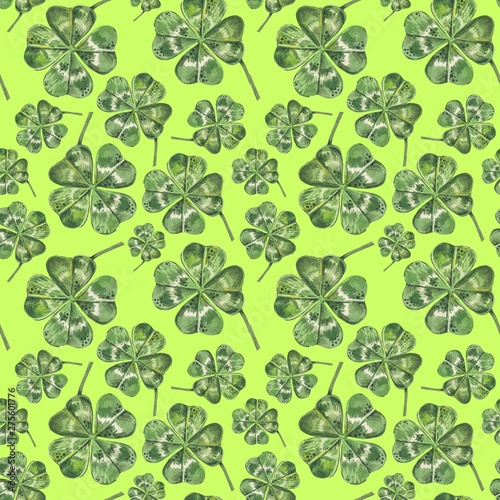 Beautiful seamless background with flowers and clover leaves using ladybugs a...