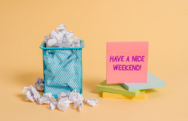 Conceptual hand writing showing Have A Nice Weekend. Concept meaning wishing someone that something nice happen holiday crumpled paper and stationary paper placed in the trash can