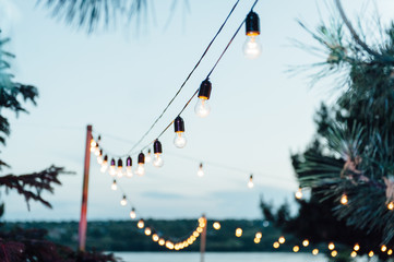 Light bulb decor in outdoor party, Wedding party