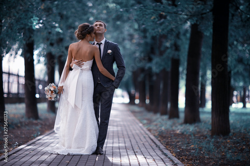 Wedding, the bride and groom on the wedding day photosession Poster Mural XXL