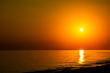Horizontal Sunset Coastline Calm Sea With Golden Sun - Late Afternoon On Beach Waterline With Golden Direct Sunset Calm Sea Ocean - Sun Sky Sea Ocean Night Time