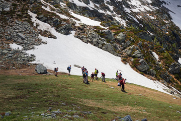 Wall Mural - Hikers near the Forca di Larecchio in Piedmont, Italy.