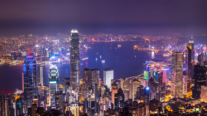 Wall Mural - High view of Hong Kong skyline cityscape night light over Victoria harbour at Victoria Peak