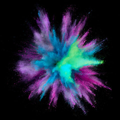 Wall Mural - Colored powder explosion. Abstract closeup dust on backdrop. Colorful explode. Paint holi