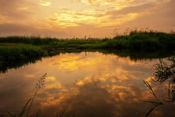 Wall Mural - Beautiful scenery of sunset on the lake