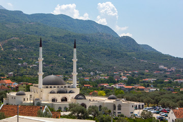 Wall Mural - Panoramic view of mosque, old town of Bar and beautiful natural landscape with mountain ranges, Bar, Montenegro