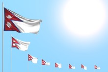 Pretty Many Nepal Flags Placed Diagonal On Blue Sky With Space For Your Content - Any Holiday Flag 3d Illustration..