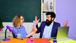 © Svitlana - Young happy students. School students. World teachers day. University students at college. Male and female teachers in auditorium. Back to school. School job. Students studying in the classroom.