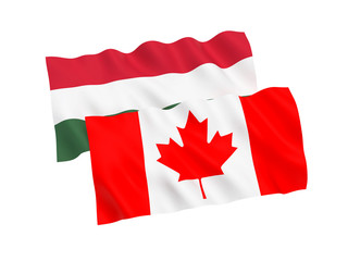 National fabric flags of Hungary and Canada isolated on white background. 3d rendering illustration. 1 to 2 proportion.