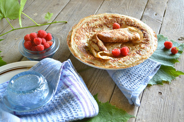 Wall Mural - American crepes.  Thin pancakes, blini on shabby table