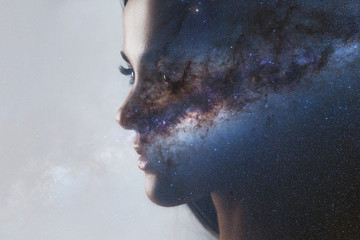 the universe inside us, the profile of a young woman and space, the effect of double exposure. scien