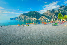 Lake Garda With Gravel Beach And Sun Loungers, Italy, Europe