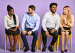 © alfa27 - diverse young people sitting in a row smiling and having relaxed fun chat and waiting for job interview