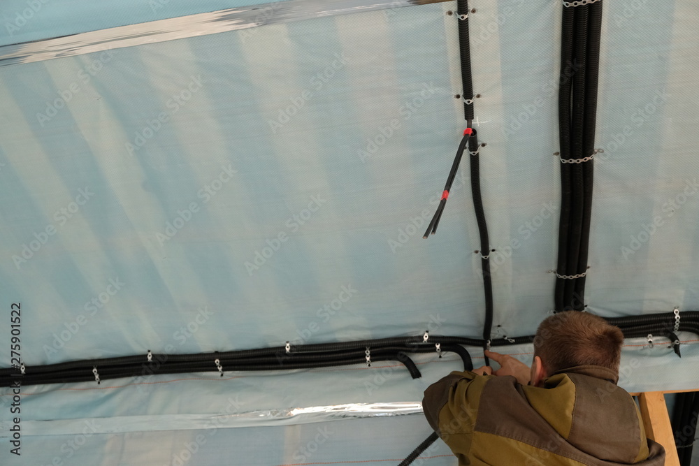 Frame House Framenet Wire Electrical cables are fixed inside the frame house. Made wiring. A ...