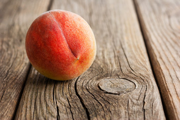 Canvas Print - peach fruit on old weathered wooden table background