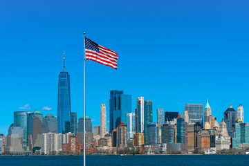 Fototapete - Scene of Flag of America over New york cityscape river side which location is lower manhattan,Architecture and building with tourist and Independence day concept