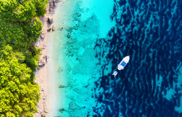 Wall Mural - Yacht on the water surface from top view. Turquoise water background from top view. Summer seascape from air. Croatia. Travel - image