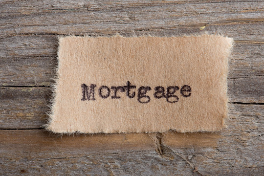 Mortgage typed text on a paper, real estate concept
