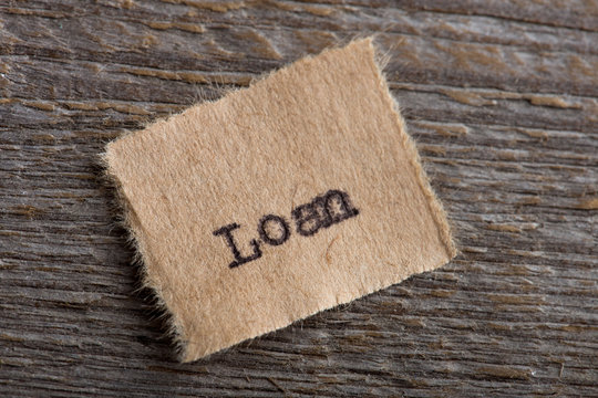 Loan typed text on a paper, real estate concept