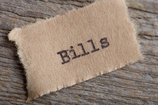 Bills typed text on a paper, real estate concept