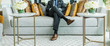 © kowitstockphoto - richness and success concept. business man sitting on a leather couch, putting his foot on the leg