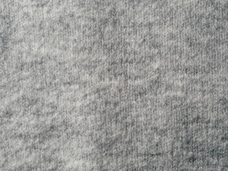 Sticker - Gray sweater fabric texture. Clothes sweater background with folds