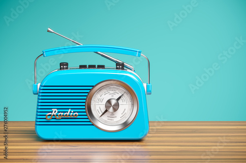Cuadros en Lienzo Vintage blue radio receiver on wood table. Wallpaper 3d