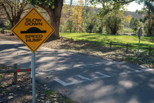 Speed Hump Road Sign Warning To Slow Down